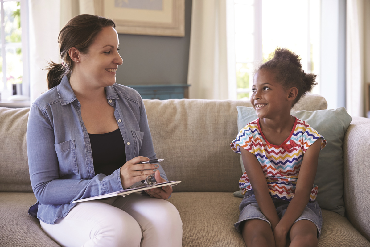 Therapist with young girl